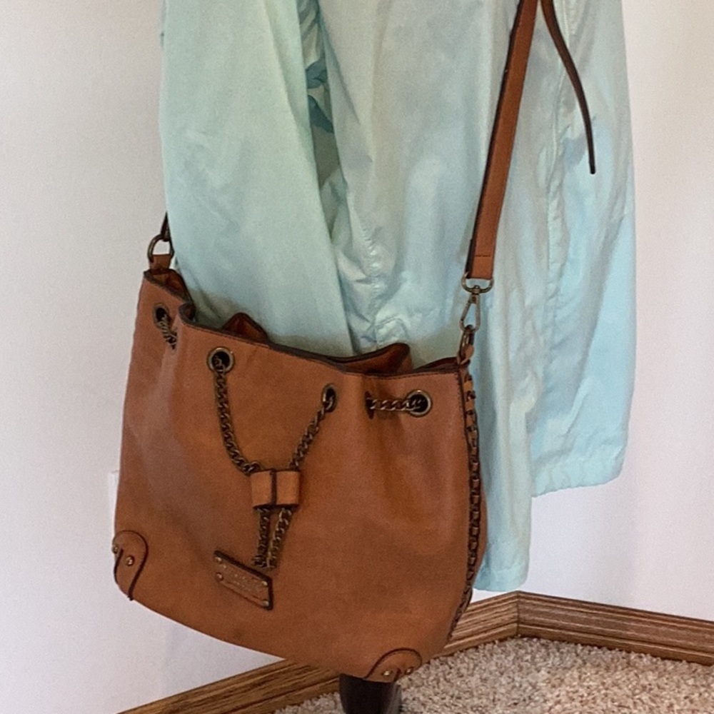 Darcy Marks London brown crossbody purse, bucket bag.